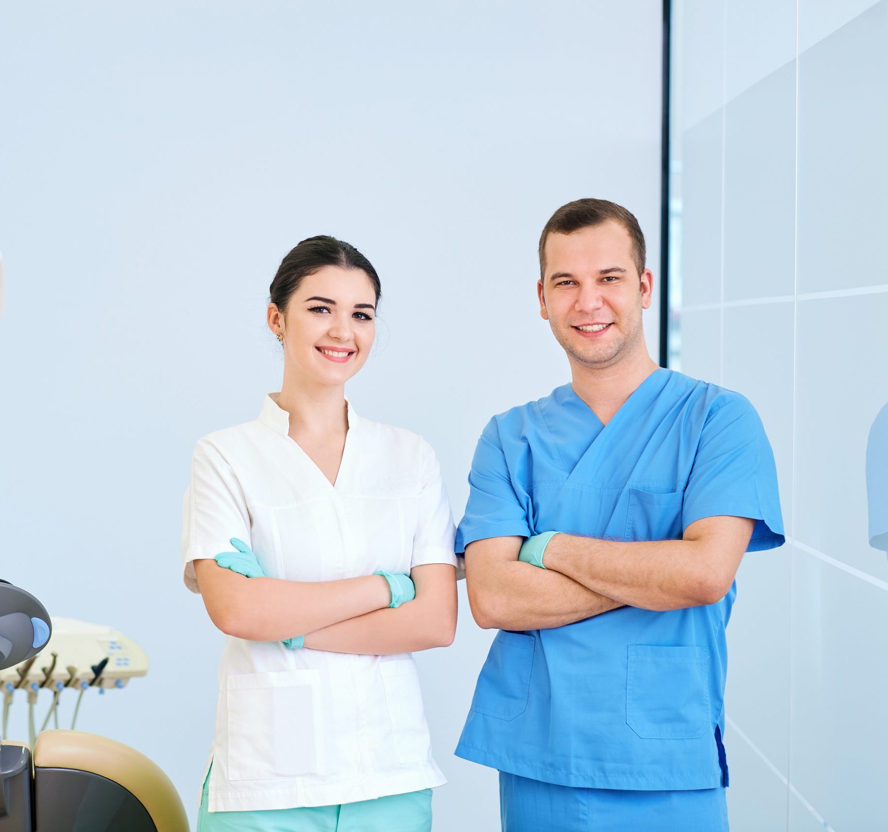 Dentist male and assistant women the workplace a dental office
